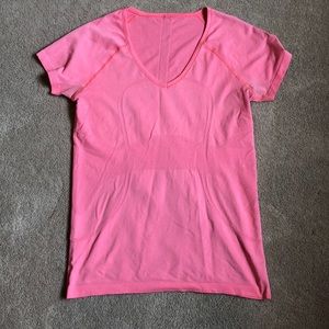 Well loved pink Lululemon Swift Tech shirt
